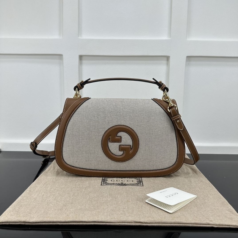 G*u*i top handle bags